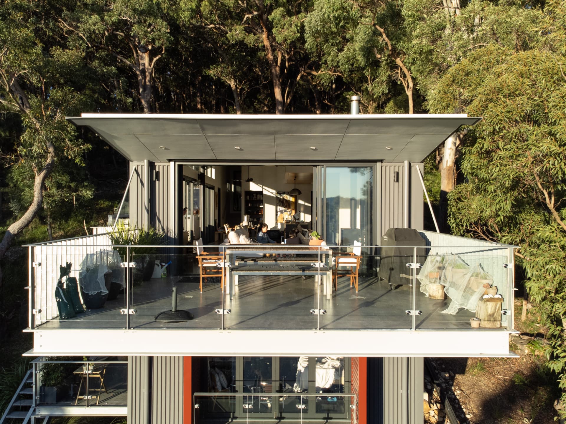 Rocky Point house with cantilevered deck set into bushland