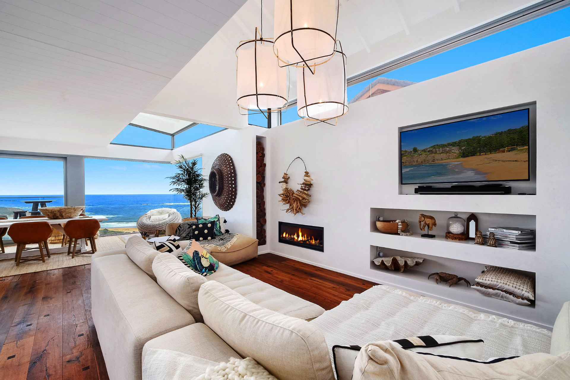 Living room with fireplace and ocean views at 16a The Scenic, Killcare